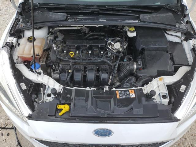 Photo 11 from auction – 2018 FORD FOCUS S with VIN 1FADP3E27JL223151