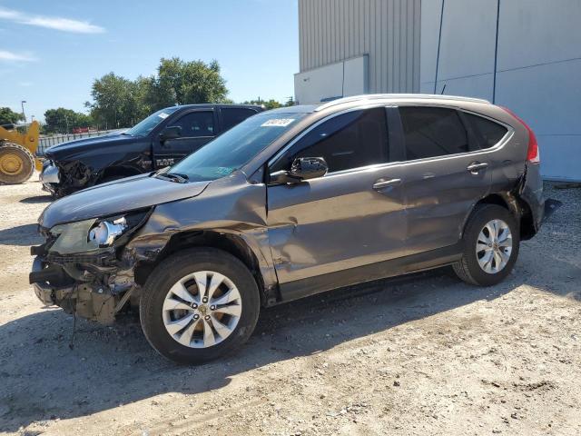 Photo 1 from auction – 2014 HONDA CR-V EXL with VIN 5J6RM4H79EL011664