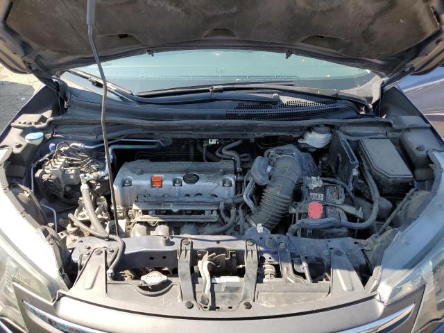Photo 12 from auction – 2014 HONDA CR-V EX with VIN 2HKRM4H50EH704423