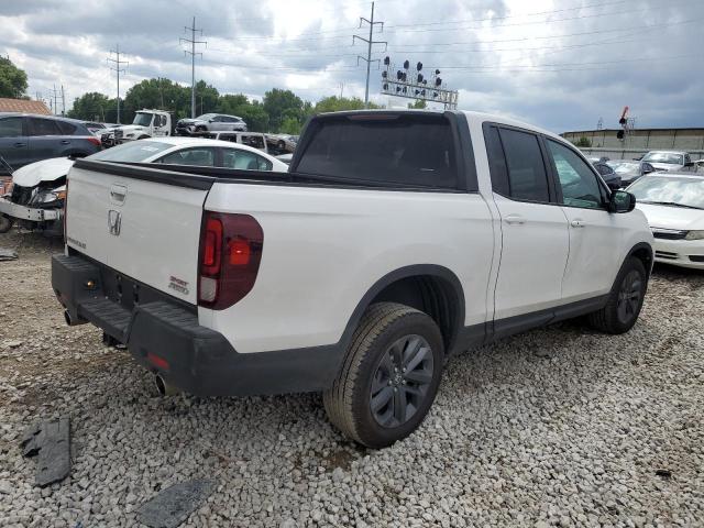 Photo 3 from auction – 2023 HONDA RIDGELINE with VIN 5FPYK3F1XPB064211