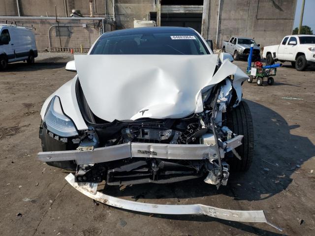 Photo 5 from auction – 2021 TESLA MODEL 3 with VIN 5YJ3E1EAXMF031639