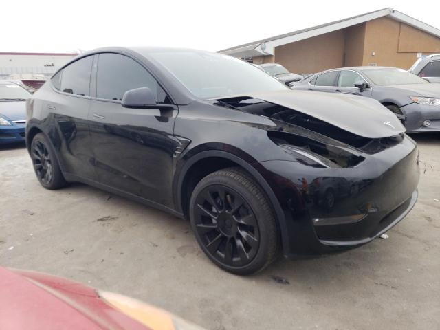 Photo 4 from auction – 2023 TESLA MODEL Y with VIN 7SAYGAEE6PF899504