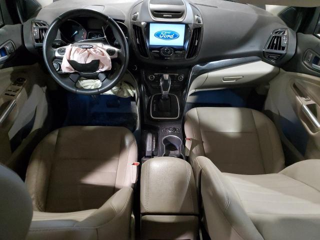 Photo 8 from auction – 2014 FORD ESCAPE TIT with VIN 1FMCU9J99EUB41048