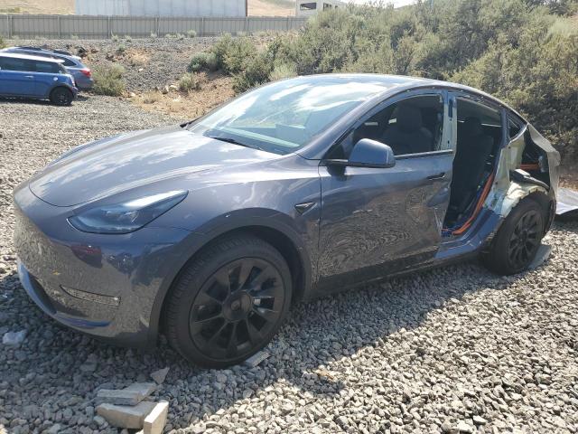 TESLA MODEL Y 2023 with VIN 7SAYGDEE0PF898110 - Photo from auction