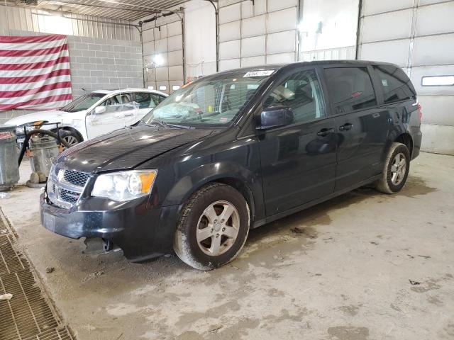 DODGE CARAVAN 2013 with VIN 2C4RDGCGXDR528699 - Photo from auction