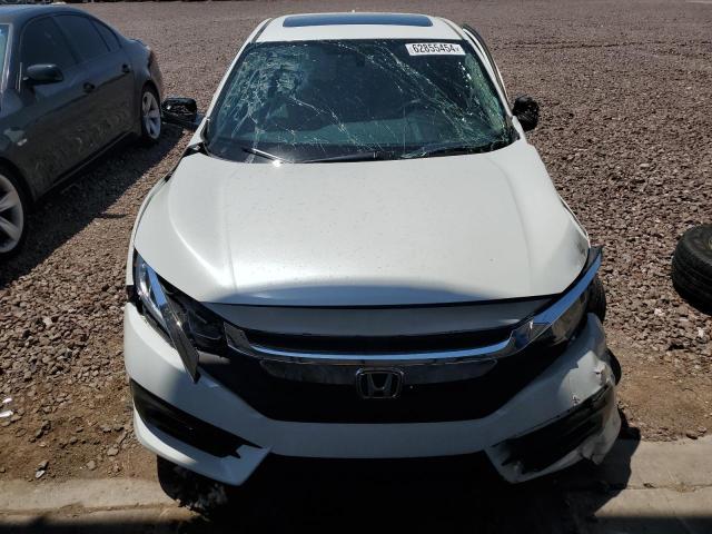 Photo 11 from auction – 2017 HONDA CIVIC EX with VIN 19XFC2F70HE079898