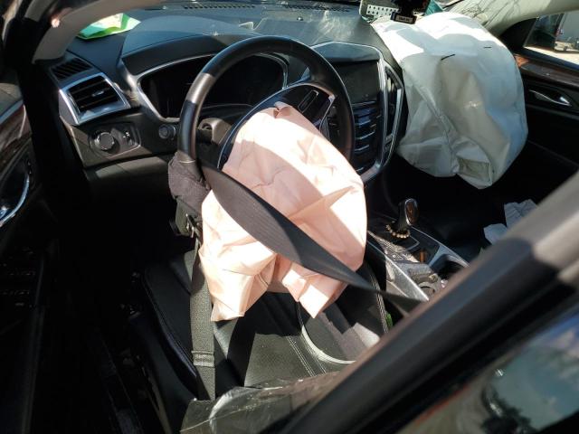 Photo 8 from auction – 2014 CADILLAC SRX LUXURY with VIN 3GYFNEE31ES677614