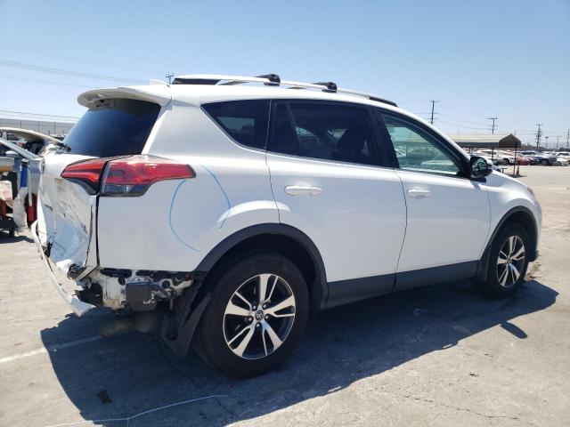 Photo 3 from auction – 2016 TOYOTA RAV4 XLE with VIN 2T3RFREV3GW429749