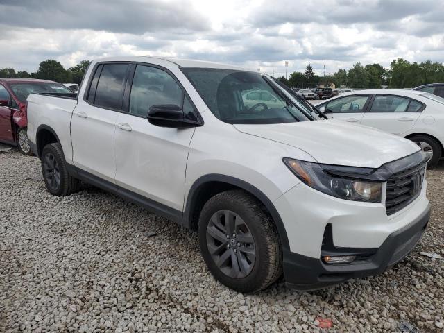 Photo 4 from auction – 2023 HONDA RIDGELINE with VIN 5FPYK3F1XPB064211