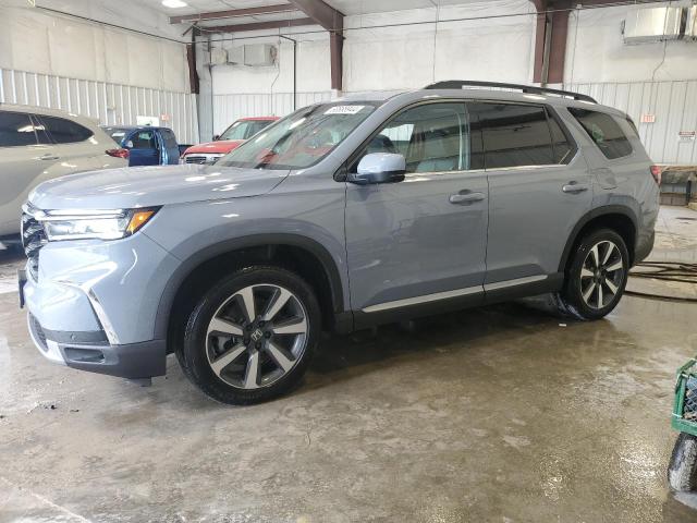 HONDA PILOT TOUR 2025 with VIN 5FNYG1H71SB021689 - Photo from auction