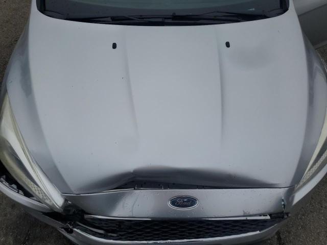 Photo 11 from auction – 2016 FORD FOCUS SE with VIN 1FADP3F26GL320803