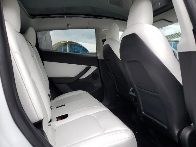 Photo 11 from auction – 2021 TESLA MODEL Y with VIN 5YJYGDEEXMF119661