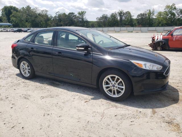 Photo 4 from auction – 2016 FORD FOCUS SE with VIN 1FADP3F21GL313547