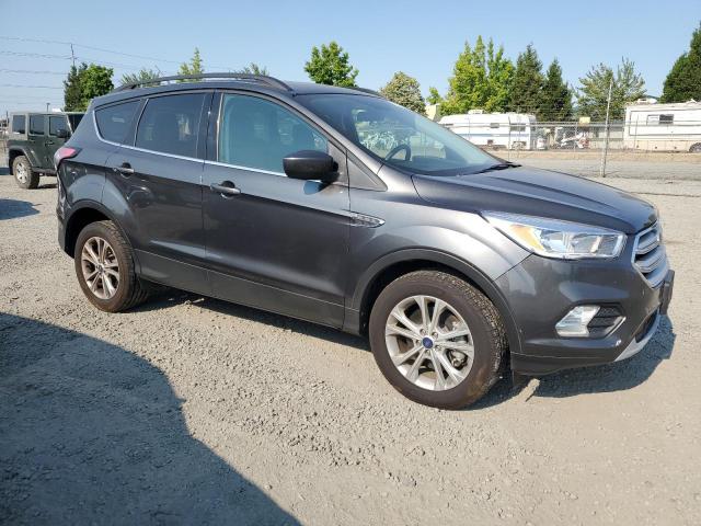 Photo 4 from auction – 2018 FORD ESCAPE SE with VIN 1FMCU0G97JUC63596