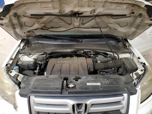 Photo 12 from auction – 2006 HONDA PILOT EX with VIN 2HKYF18716H548187