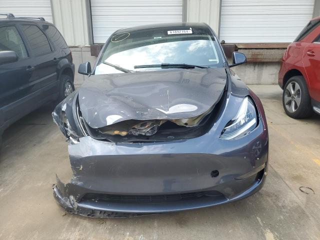 Photo 5 from auction – 2023 TESLA MODEL Y with VIN 7SAYGDEE3PA030339