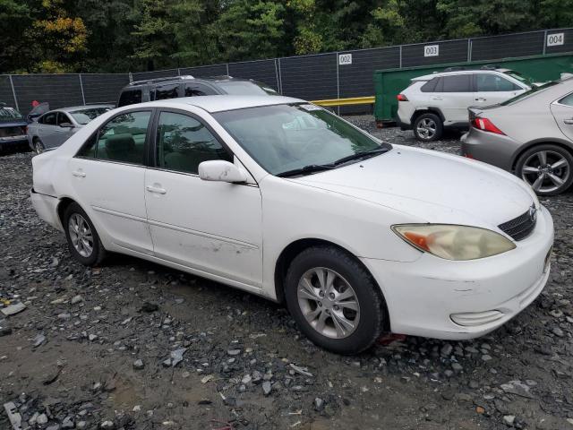 Photo 4 from auction – 2004 TOYOTA CAMRY LE with VIN 4T1BF30KX4U071856