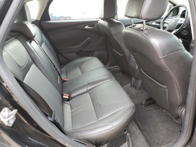 Photo 10 from auction – 2014 FORD FOCUS TITA with VIN 1FADP3N29EL321300