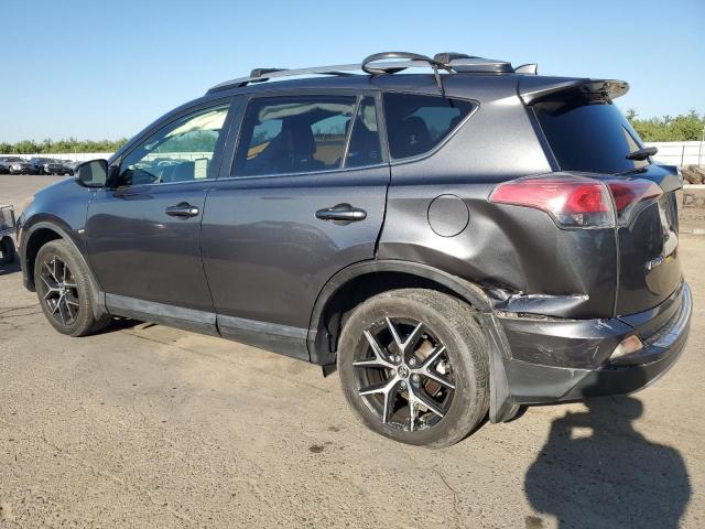 Photo 2 from auction – 2017 TOYOTA RAV4 SE with VIN JTMJFREV0HJ130572