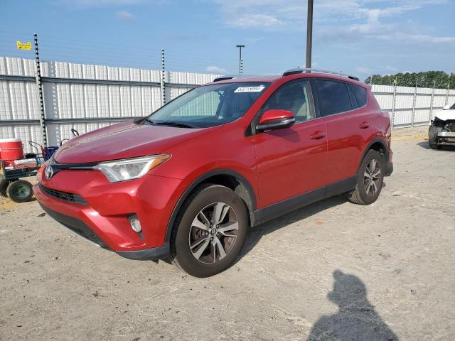 TOYOTA RAV4 XLE 2016 with VIN JTMRFREV3GJ101052 - Photo from auction