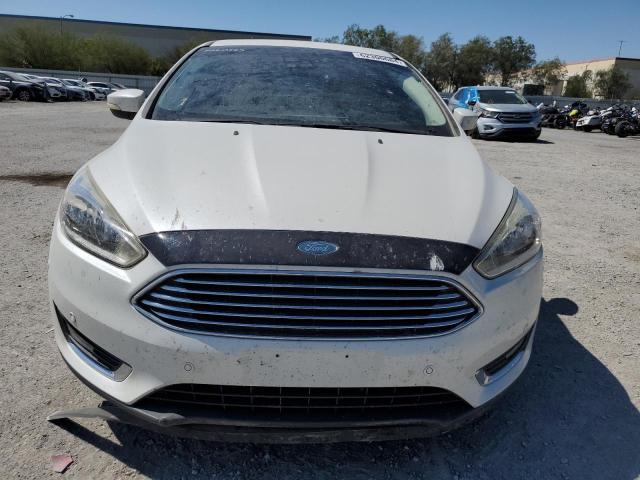 Photo 5 from auction – 2016 FORD FOCUS TITA with VIN 1FADP3J20GL209106