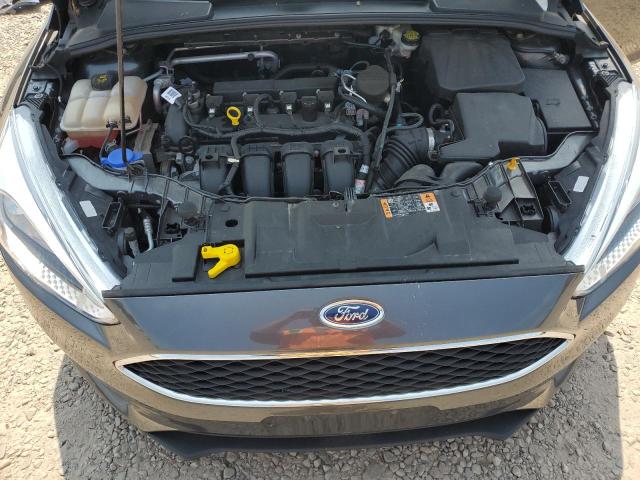 Photo 11 from auction – 2016 FORD FOCUS SE with VIN 1FADP3F20GL304080