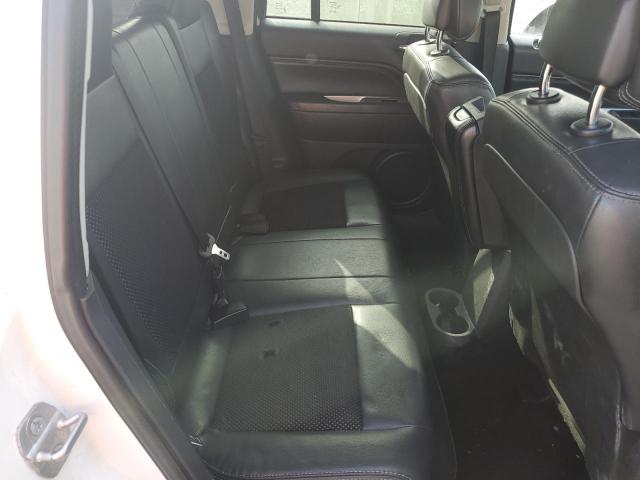 Photo 11 from auction – 2014 JEEP COMPASS LA with VIN 1C4NJCEA9ED678719