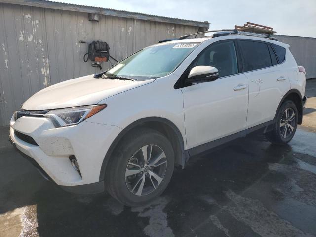 TOYOTA RAV4 ADVEN 2018 with VIN 2T3WFREV2JW516472 - Photo from auction