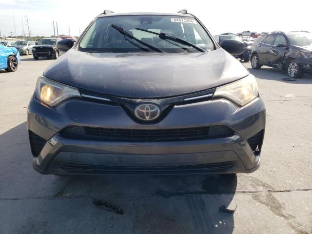 Photo 5 from auction – 2018 TOYOTA RAV4 with VIN JTMZFREV9JJ157438