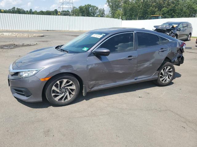 HONDA CIVIC EX 2018 with VIN 2HGFC2F7XJH572130 - Photo from auction