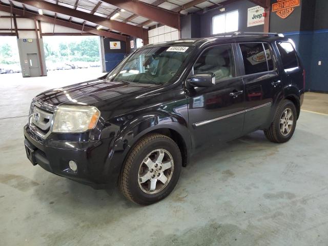HONDA PILOT TOUR 2011 with VIN 5FNYF4H92BB070972 - Photo from auction