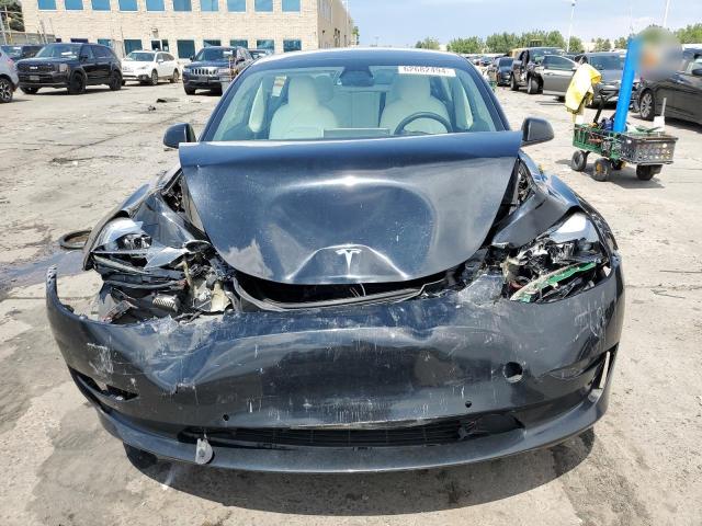 Photo 5 from auction – 2021 TESLA MODEL 3 with VIN 5YJ3E1EA9MF032085