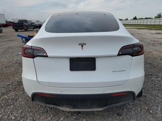 Photo 6 from auction – 2022 TESLA MODEL Y with VIN 7SAYGAEE8NF508396