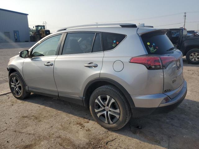 Photo 2 from auction – 2018 TOYOTA RAV4 LE with VIN JTMZFREV7JJ163464