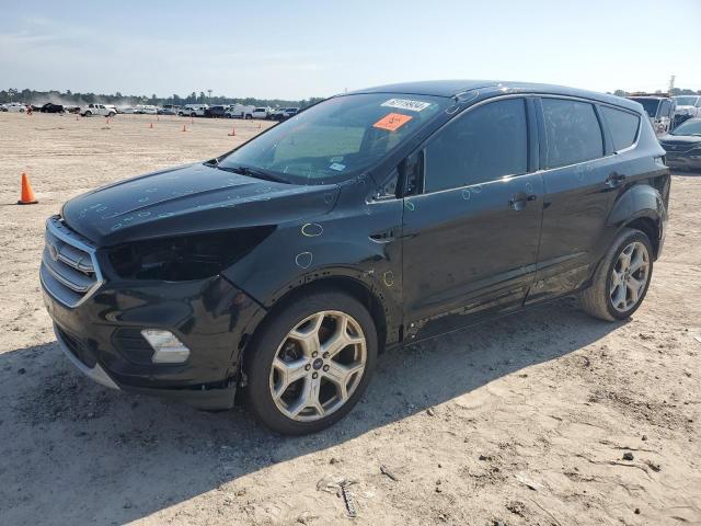 FORD ESCAPE TIT 2018 with VIN 1FMCU0J95JUA41664 - Photo from auction