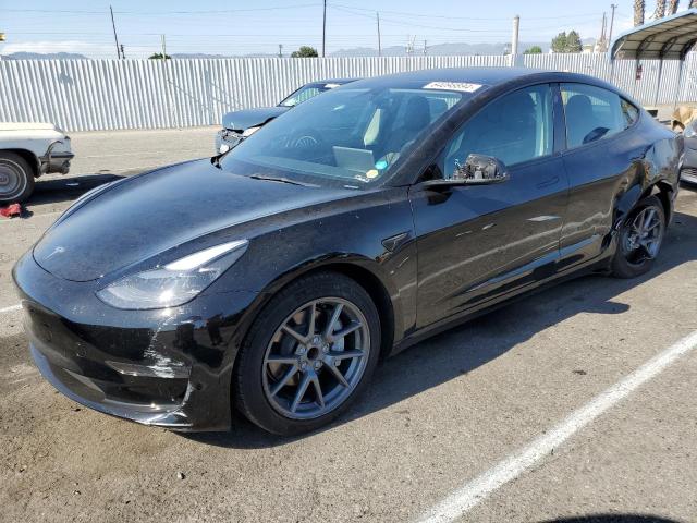 TESLA MODEL 3 2022 with VIN 5YJ3E1EA2NF361146 - Photo from auction