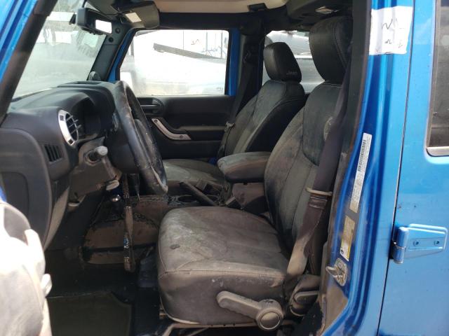 Photo 7 from auction – 2014 JEEP WRANGLER U with VIN 1C4BJWDG4EL184123
