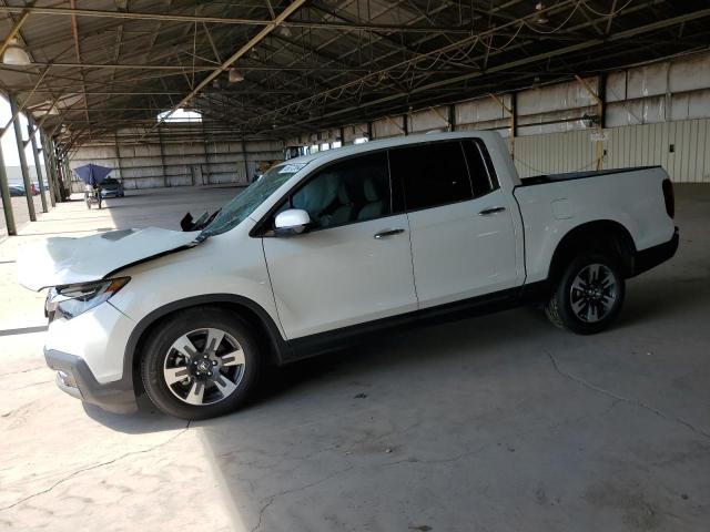 HONDA RIDGELINE 2018 with VIN 5FPYK3F77JB014815 - Photo from auction