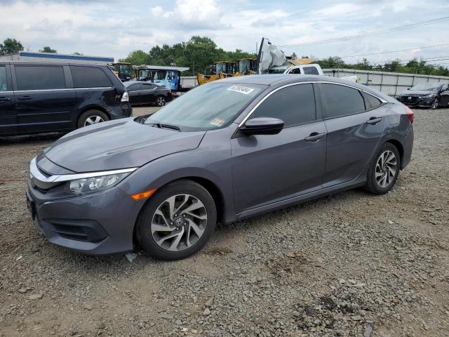 HONDA CIVIC EX 2017 with VIN 2HGFC2F7XHH562613 - Photo from auction