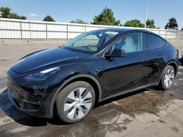 TESLA MODEL Y 2023 with VIN 7SAYGDED4PF909844 - Photo from auction