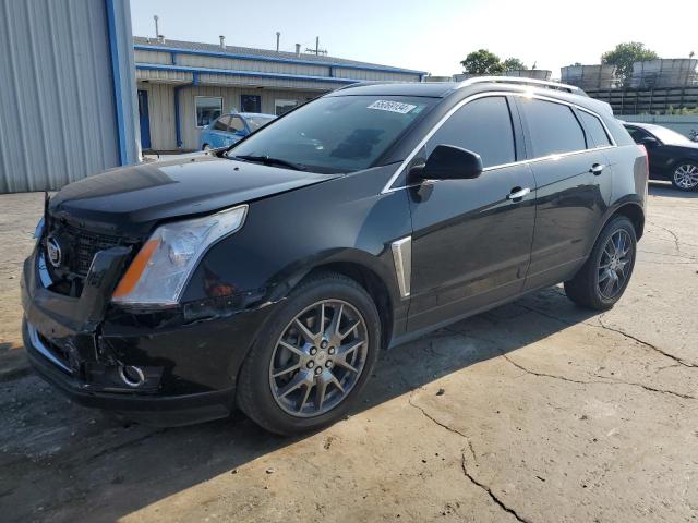 CADILLAC SRX PREMIU 2014 with VIN 3GYFNGE32ES567635 - Photo from auction