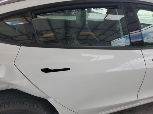 Photo 10 from auction – 2021 TESLA MODEL 3 with VIN 5YJ3E1EA3MF955517