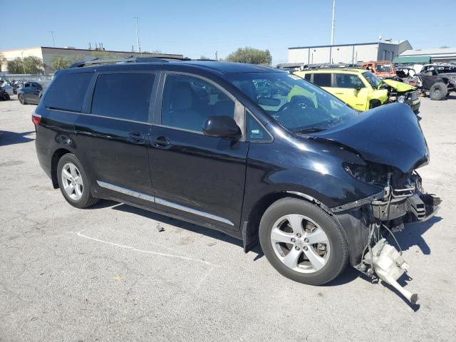 Photo 4 from auction – 2015 TOYOTA SIENNA LE with VIN 5TDKK3DC0FS676897