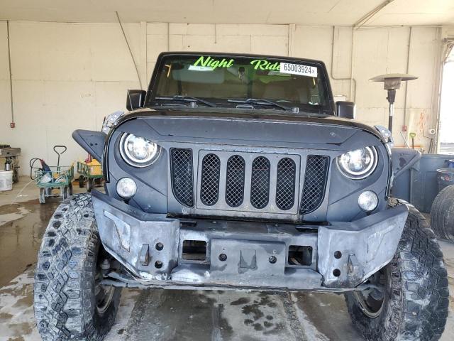 Photo 5 from auction – 2015 JEEP WRANGLER U with VIN 1C4BJWDG3FL667538