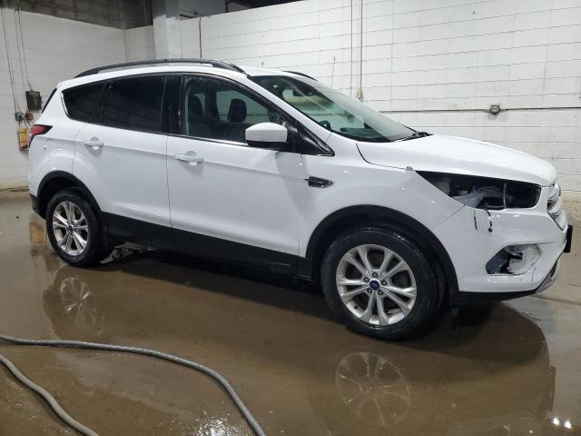 Photo 4 from auction – 2018 FORD ESCAPE SE with VIN 1FMCU9GD6JUA76195