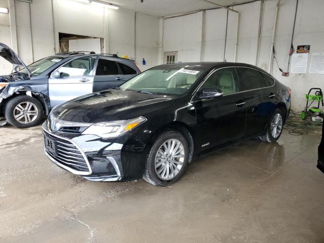 TOYOTA AVALON HYB 2016 with VIN 4T1BD1EB4GU051982 - Photo from auction