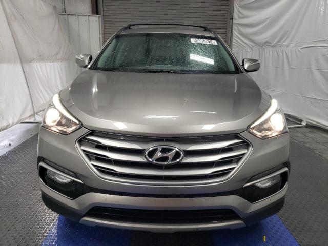 Photo 5 from auction – 2018 HYUNDAI SANTA FE S with VIN 5NMZU3LB2JH066786