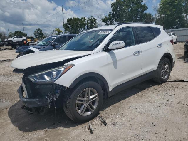 HYUNDAI SANTA FE S 2017 with VIN 5NMZU3LB3HH022211 - Photo from auction