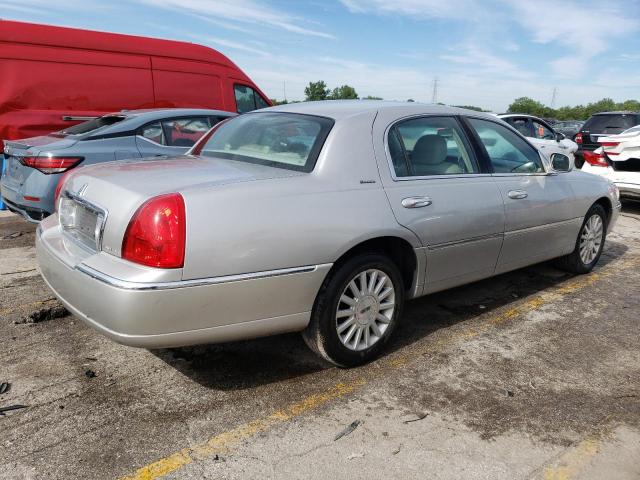 Photo 3 from auction – 2003 LINCOLN TOWN CAR E with VIN 1LNHM81W13Y700894