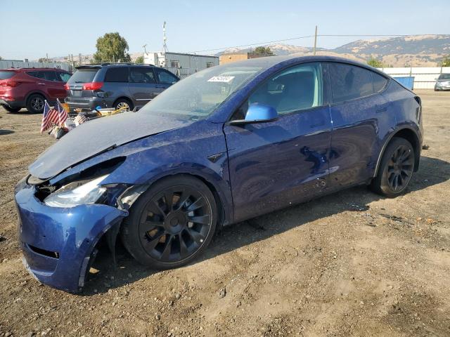TESLA MODEL Y 2022 with VIN 7SAYGDEE0NF329058 - Photo from auction